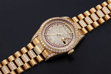 rolex day date gold diamond.